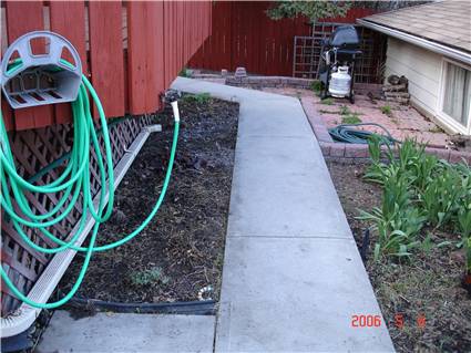 cleaned back yard - under deck